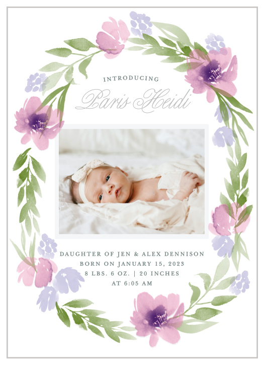 Surround your child with the watercolor flowers and greenery of the Floral Delight Baby Announcements.