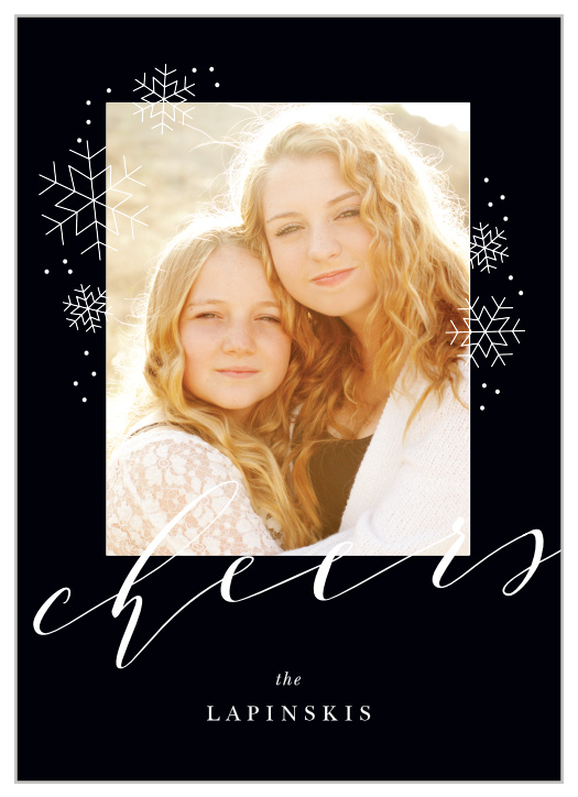 On the rich black background of our Charcoal Chic Holiday Cards, adorned with white snowflakes and two typefaces, is a gorgeous photo of your family.