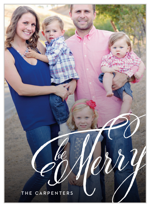 A gorgeous family photo sets the scene for our Fancy Calligraphy Holiday Cards, serving as a beautiful backdrop for the swirling, swooping script that declares your holiday greetings. 
