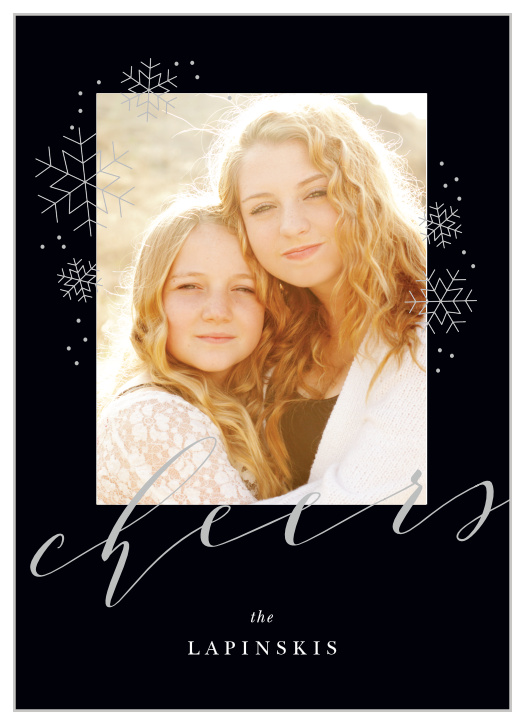 On the rich black background of our Charcoal Chic Foil New Year Cards, adorned with metallic foil snowflakes and typefaces, is a gorgeous photo of your family.