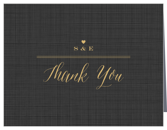 A rustic-esque plaid background is offset by a gold foiled, stylish heart emblem and calligraphy.