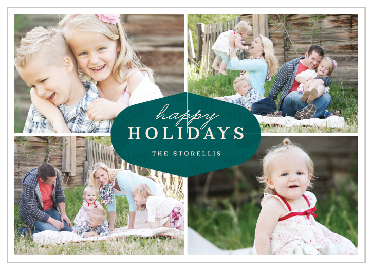 Upload your own favorite photos to create the perfect quartet for your Center Crest Photo Holiday Cards.