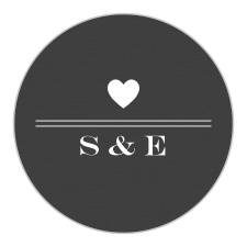 A rustic-esque plaid background is offset by a white stylish heart emblem containing your initials!