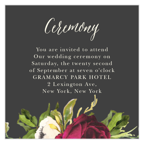 The Garden Romance Ceremony Cards feature a stormy grey background that is contrasted by a vivid bouquet and a cream colored calligraphy.
