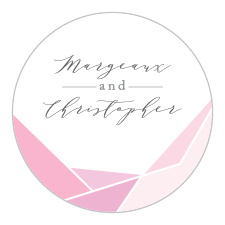 Our Playful Lines Wedding Stickers strive to stay as simple as possible, containing only your names in a soft script, floating in space above angled pink shapes.