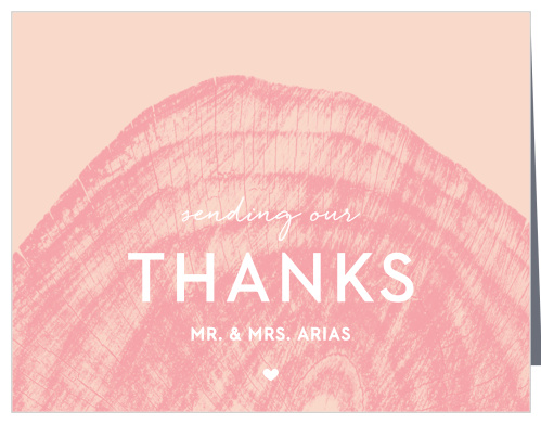 Our Wooden Love Wedding Thank You Cards feature an intricate and semi-transparent, pomegranate colored wooden stump atop a ballet colored background.