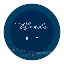 Seal your envelopes and decorate your stationery with our Stunning Starlight Wedding Stickers. A duo of blues decorates the majority of the card, accented by crisscrossing silver star lines, a neat calligraphy for expressing your gratitude, and your initials in a classic print.