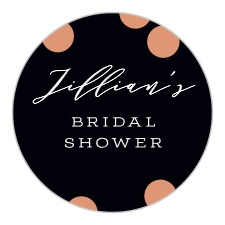 Rose gold foiled confetti sits atop a rich black background.