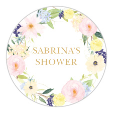 You name and event done up in gold foil sit within a softly colored flower crown.