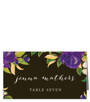 Guide your guests to their seats with our stunning Purple Blooms Place Cards. Purple and white flowers grow across their surface, carefully framing your guests' names in white calligraphy and the table number in a clean print. With these beautiful cards to direct them, your guests will stay rooted throughout the reception.