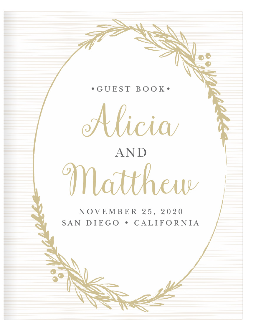 Frame your beautifully scripted names in a rustic gold wreath with the Delicate Laurel Guest Book.