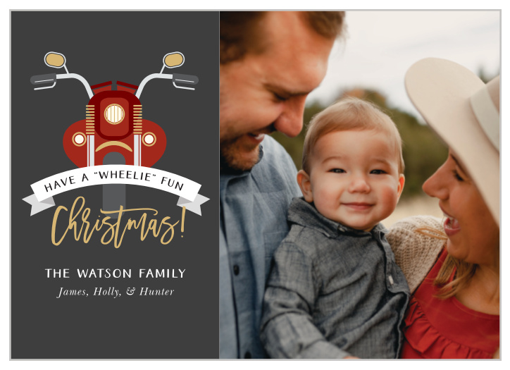 Send your holiday greetings rumbling into the homes of your friends and family with our Merry Motorcycle Christmas Cards. A gorgeous script sprawls across the center of the page in shining gold-foil, resting just inside the wheel well of our red motorcycle and spelling out your holiday joy.