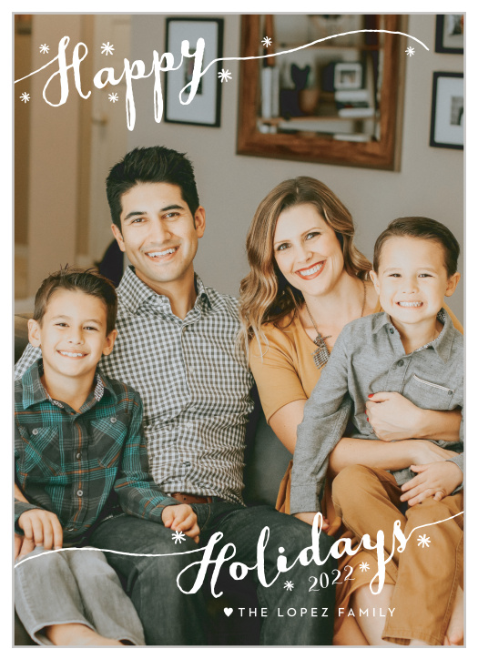 Our Luxury Script Holiday Cards offer the perfect blend of modern style and classic warmth, utilizing a swirling script and softly-falling snowflakes for a gorgeous look. With your favorite photo of your family decorating the background, these cards are a gorgeous way to say 
"Happy Holidays!"