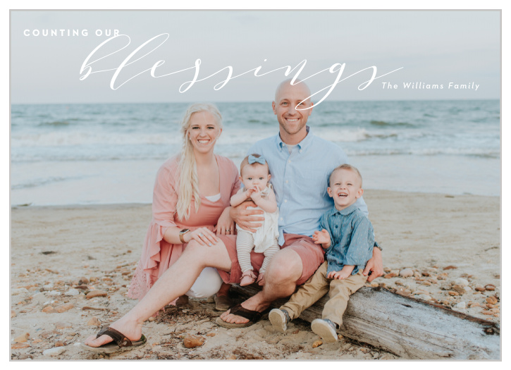 Our stunningly simple Counting Blessings Holiday Cards send a message of holiday cheer, focusing on the most important part of the season: your family. Your favorite photo serves as the background of the card, with a swirling overlay of calligraphy for your well-wishes.