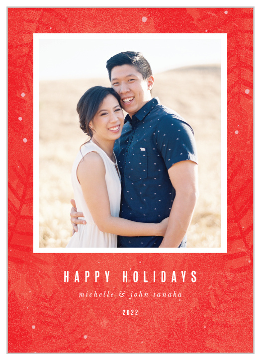 Wish your friends and family the happiest of holidays with our stunning Contemporary Botanical Holiday Cards. A festive red decorates the background, covered in lightly illustrated branches and leaves. With your favorite photo in the center of the card and your winter greetings in a clean-cut white print, these cards are as easy to love as they are to read.
