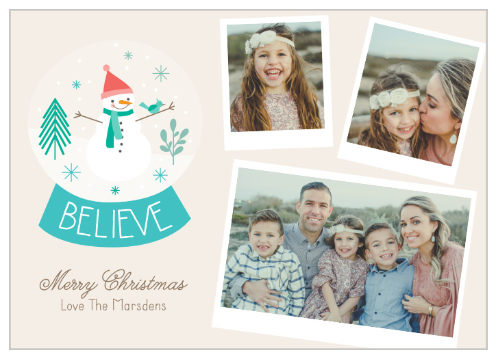 Our Snowman Snapshot Christmas Cards feature polaroid of you and your family that are scattered across one side of the card, and a darling illustration of snow-globe on the other.