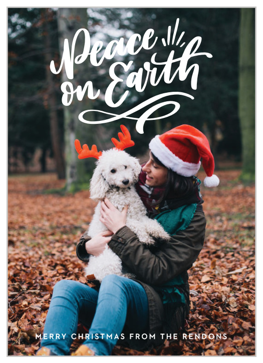 Send your Peace & Puppies Christmas Cards to your nearest and dearest friends and family for a perfectly heartwarming message in a cold season. Your message swirls like freshly falling snow across the top of the card, hovering over your choice of photo as its background.