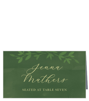 Guide every guest to their seats with the stunning pale golds and lovely leaf greens of our Forest Fairytale Place Cards. Each guest's name is written out in a smooth calligraphy, crowned by a simple arch of light-green leaves and underlined by the table's number. With a deep, woodsy-green to serve as the card's background, you can be sure that they'll look lovely when paired with your centerpieces. 