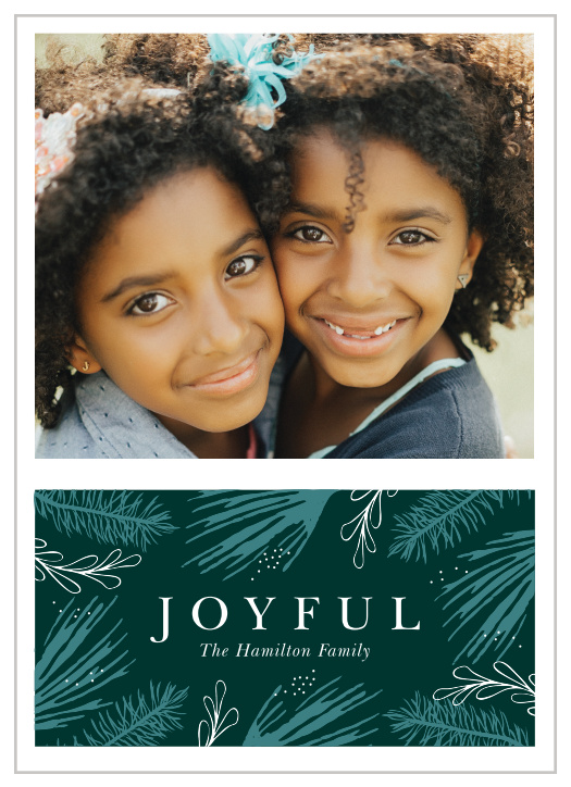 If you're looking for a classic design with a modern touch, our Joyful Branches Holiday Cards might fit your needs perfectly.
