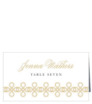 Help your guests to their assigned seats with the stunning style of our Irish Knot Place Cards. Shining gold-foil covers the page, forming an elegant calligraphy for each guest's name as well as an intricate, interwoven set of Celtic symbols. With the table number in sheer black print against the white background, you can be sure that your friends and family are precisely where you want them.