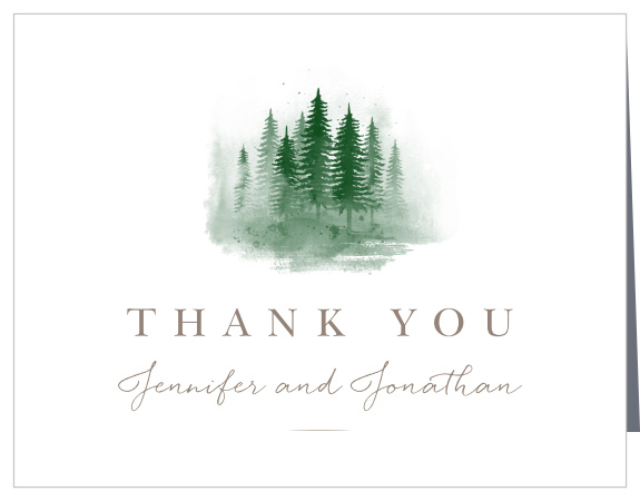 A dreamy scene of a pine tree forest adorns the center of the Watercolor Evergreens Vow Renewal Thank You Cards.
