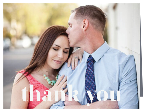 A beautiful photo of the happy couple serves as the background of our Chic Editorial Wedding Thank You Cards!