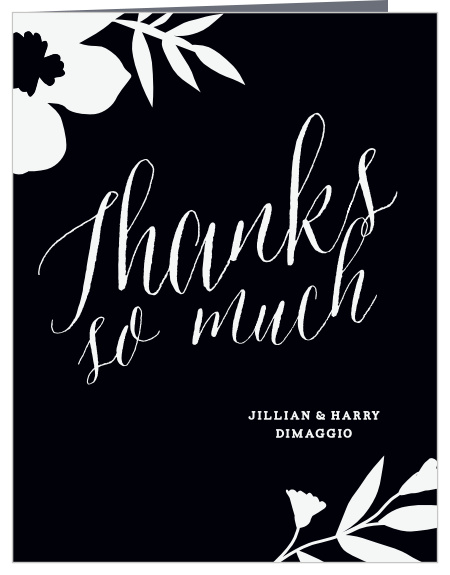 Timeless calligraphy flows through the center of each of our MaeMae's Jett Wedding Thank You Cards, framed in opposite corners by stunning, high-contrast florals.
