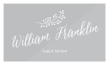 A soft cursive spells out the names of your guests on our Floral Calligraphy Clear Wedding Place Cards!