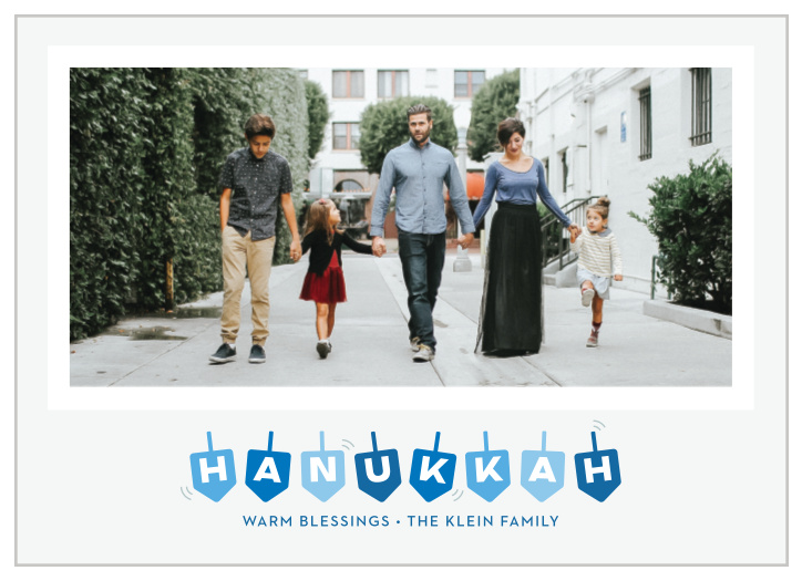 Get ready to celebrate the holidays with our Dizzy Dreidel Hanukkah Cards!