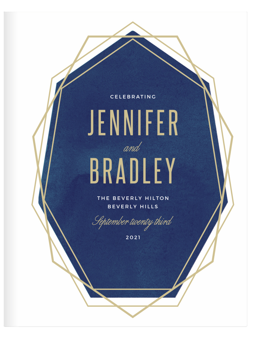 Customize the cool golden angles and deep navy geometric watercolor background of the Divinely Modern Guest Book.