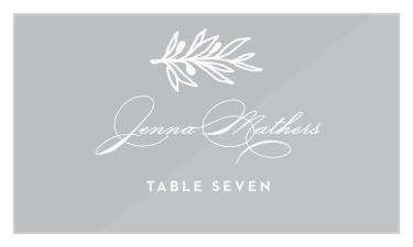 Family and friends will have no issue finding their seats for your wedding reception with our Monogram Sprig Clear Place Cards.