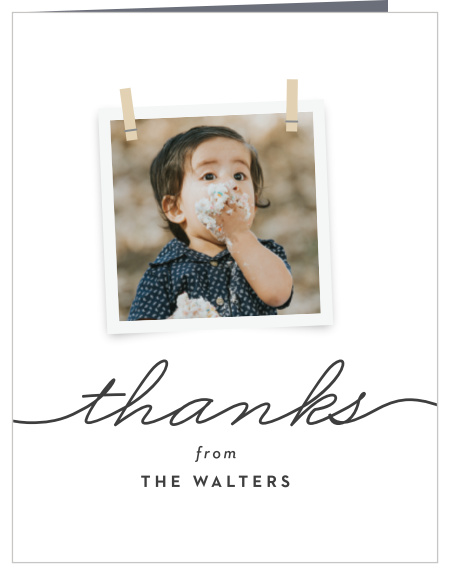 Thank everyone that supported your little one's big day with our Photo Clothes Line First Birthday Thank You Cards. These adorable cards feature three of your favorite photos clothespinned to a string across the background.