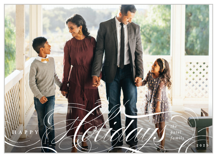 Send your season's greeting to family and friends with our Swash Script Holiday Cards.