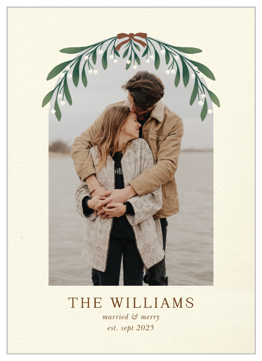 Celebrate your recent marriage with family and friends by sending them the Mistletoe Couple Holiday Cards!
