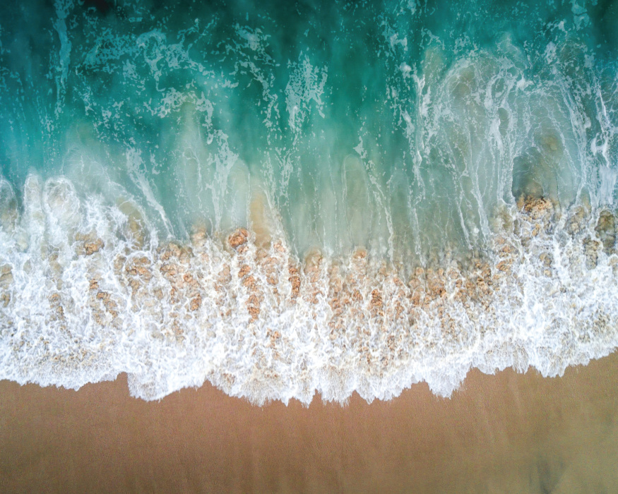 Completely reinvent your space with our Water & Sand Peel and Stick Mural.