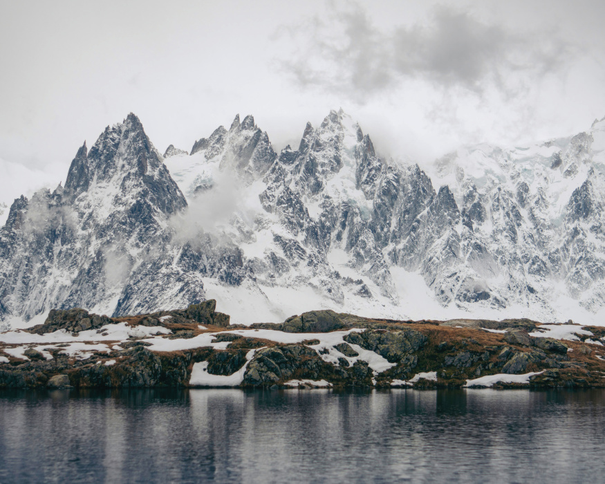 Incorporate this stunning vista into your home design with our Snowy Mountains Peel & Stick Photo Mural.