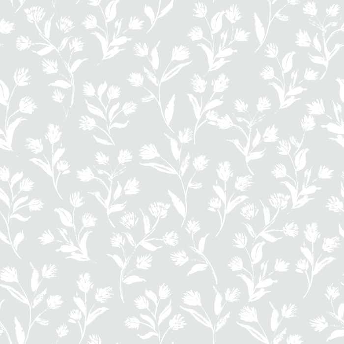 Create a warm, welcoming atmosphere with Golden Flourish wallpaper, featuring a charming botanical sprig pattern in soft cream on a golden brown background.