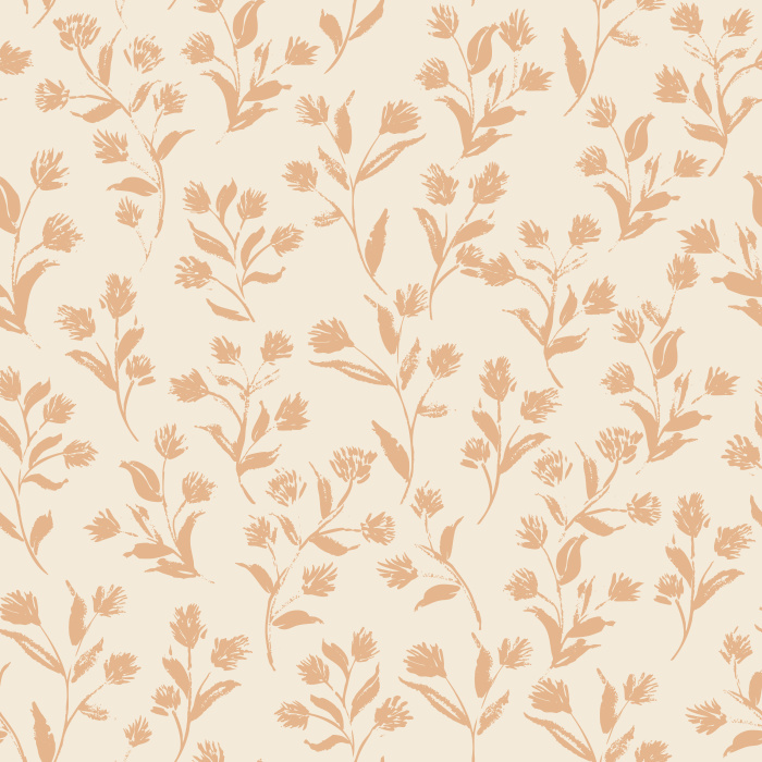 Create a warm, welcoming atmosphere with Golden Flourish wallpaper, featuring a charming botanical sprig pattern in soft cream on a golden brown background.