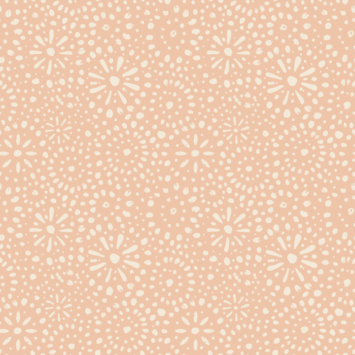 Energize your space with Stardusted Boho wallpaper, featuring a playful dotted starburst pattern in warm tan on a rich, earthy red background.