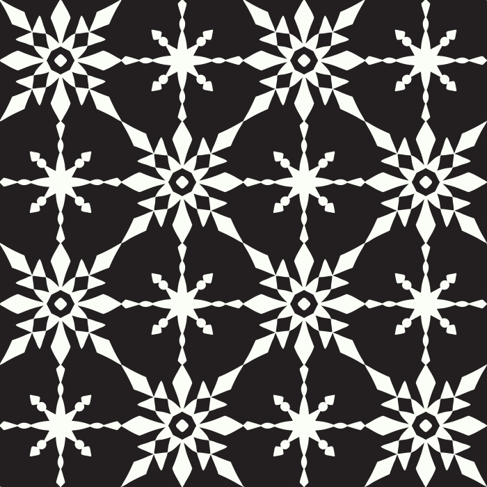 The Retro Quilt Wallpaper features a geometric floral star pattern in warm golden yellow on a soft cream background, inspired by mid-century quilt designs.