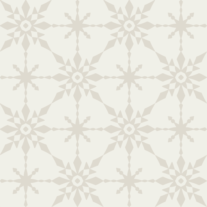 The Retro Quilt Wallpaper features a geometric floral star pattern in warm golden yellow on a soft cream background, inspired by mid-century quilt designs.