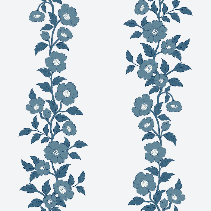 The Heirloom Vine Wallpaper features elegant vertical stripes of soft blue-green floral vines set against a warm cream background.