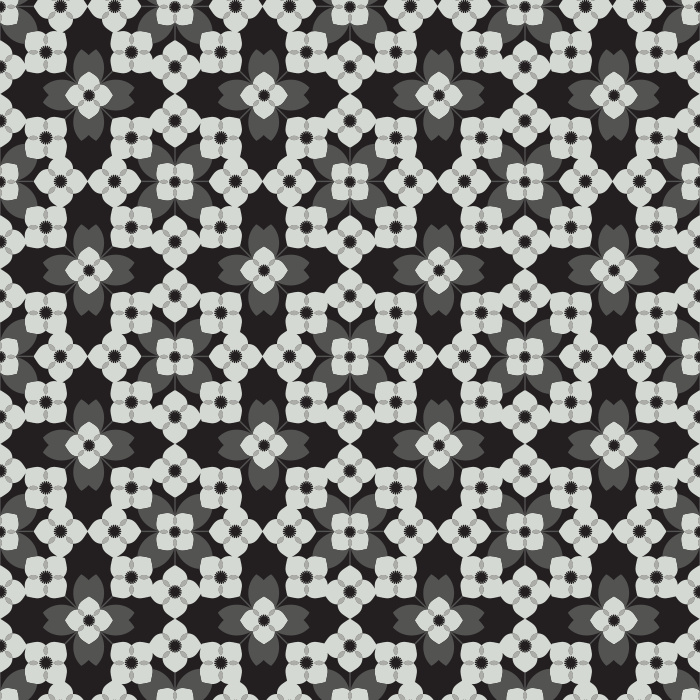 The Floral Quilt Wallpaper blends retro charm with cozy cottage warmth, featuring a geometric floral pattern in fresh shades of green and white with soft golden accents.