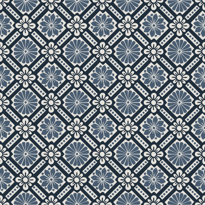 Historic Blooms Wallpaper features a tile-inspired floral motif arranged in a bold geometric grid with navy, cream, and warm brown tones.