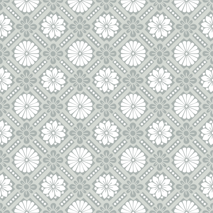 Historic Blooms Wallpaper features a tile-inspired floral motif arranged in a bold geometric grid with navy, cream, and warm brown tones.