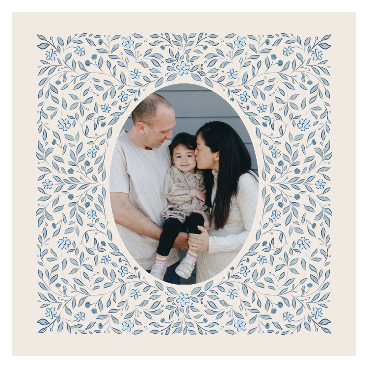 Blooming Frame Photo Art Print surrounds a favorite photo with delicate flowers, leafy vines, and a graceful oval frame for a charming personalized display.
