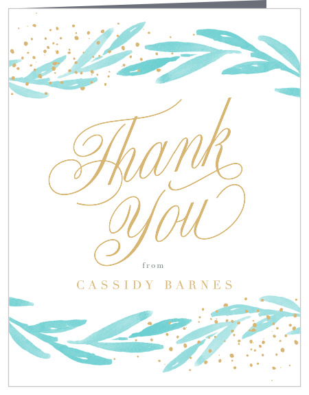 Our Memorable Year Graduation Thank You Card is a modern design with foliage and gold specks running along the top and bottom.