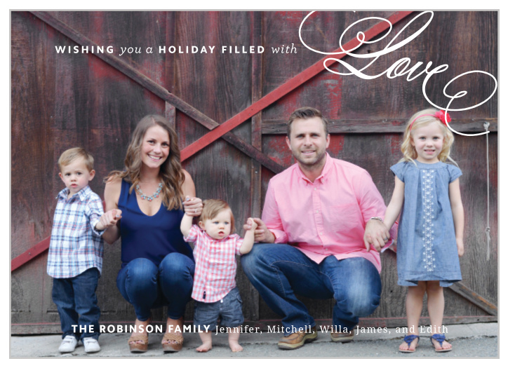 This is a classic holiday card that contains a large photo background, two simple text areas and a scripted "Love" badge.