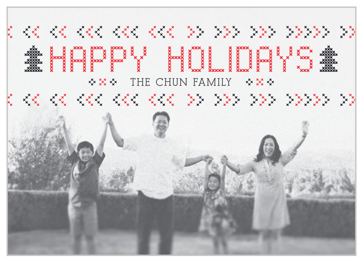 Beautiful cross-stitch designs adorn this full-photo holiday card.