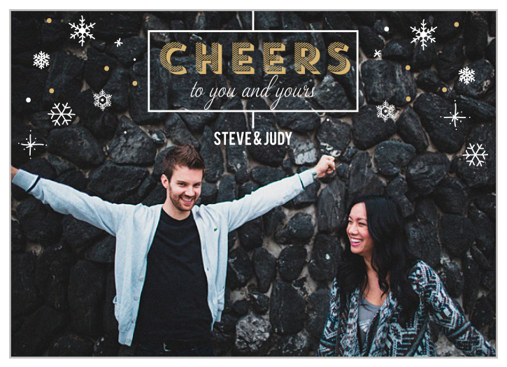 A fun faux glitter texture strategically fills snowflakes, text and other various elements on this classic and elegant photo holiday card.